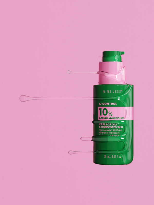 NINE LESS Azelaic Acid Serum bottle lying on pink background with serum texture streaming from pump