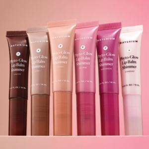 Full shade lineup of Naturium Phyto Glow Lip Balm Shimmer tubes including Galaxy, Orbit, Cosmic, Eclipse, Supernova and Stardust.