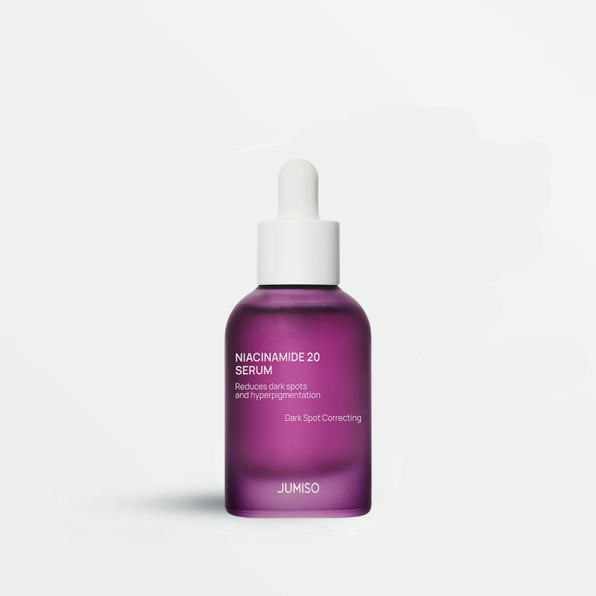 Jumiso Niacinamide 20 Serum bottle with purple glass packaging on white background