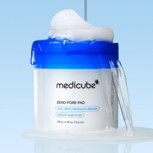 Medicube Zero Pore Pad 70 pads jar with toner essence dripping over blue lid